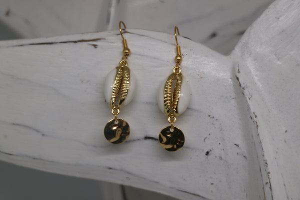 Load image into Gallery viewer, White and gold cowrie sea shell earrings with gold plated charms
