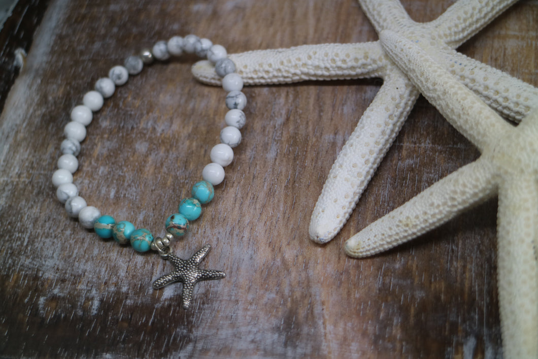 White howlite and blue sea sediment jasper gemstone beaded bracelet with silver starfish charm