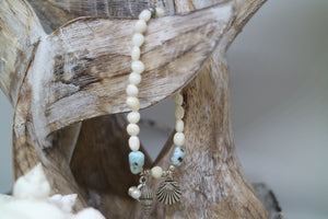 White shell Larimar gemstone bracelet with silver shell charms