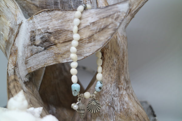 Load image into Gallery viewer, White shell Larimar gemstone bracelet with silver shell charms
