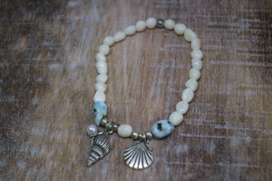 White shell Larimar gemstone bracelet with silver shell charms