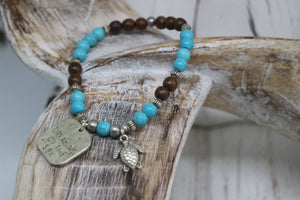 Blue howlite gemstone and wood beaded bracelet with silver rustic 'dreaming of the sea' and turtle charms