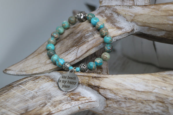 Load image into Gallery viewer, Blue Sea Sediment Jasper beaded bracelet with silver &#39;the beach is my happy place&#39; charm
