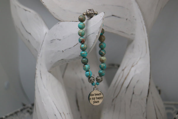 Load image into Gallery viewer, Blue Sea Sediment Jasper beaded bracelet with silver &#39;the beach is my happy place&#39; charm
