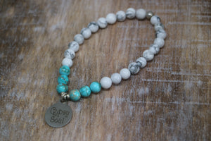 White howlite and blue sea sediment jasper gemstone beaded bracelet with silver 'gypsy soul' charm