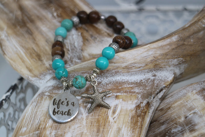 Turquoise gemstone and wood beaded bracelet with silver 'life's a beach' and starfish charms
