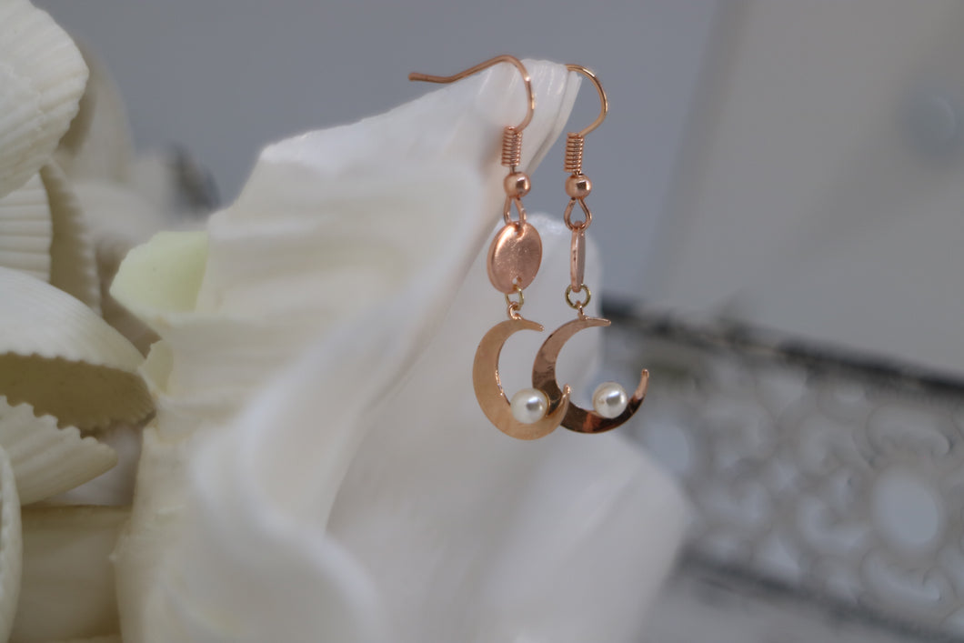 Rose gold pearl earrings with moon charms