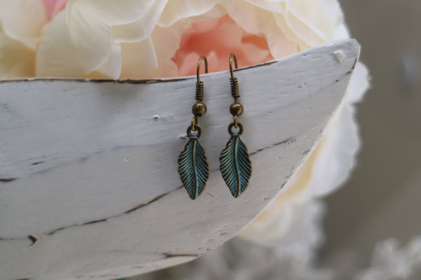 Load image into Gallery viewer, Bronze patina bohemian feather earrings
