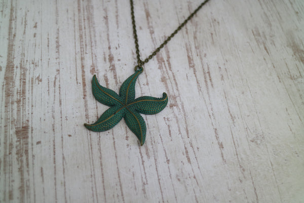 Load image into Gallery viewer, Green Bronze patina starfish boho necklace
