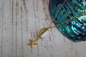 Gold shell necklace with starfish charm