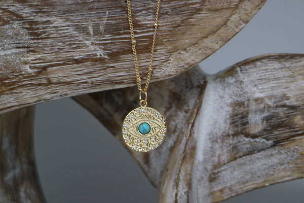 Load image into Gallery viewer, Gold Evil Eye Necklace with cubic zirconia and turquoise
