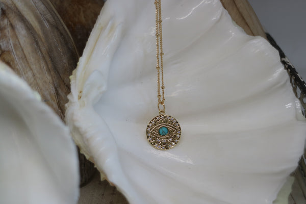 Load image into Gallery viewer, Gold Evil Eye Necklace with cubic zirconia and turquoise
