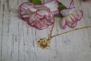 Gold Daisy Flower Necklace with cubic zirconia