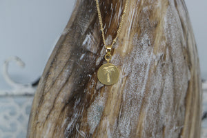 Gold palm tree coin necklace