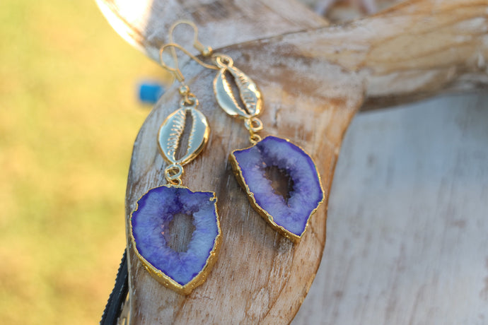 Purple Goede Druzy Agate earrings with gold plated edges and gold plated cowrie shell connectors