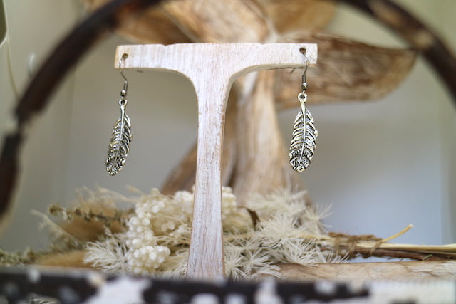 Silver bohemian feather earrings