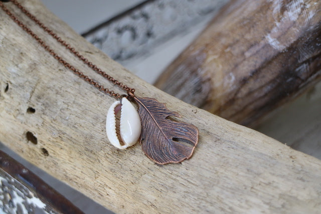 Bohemian copper feather and cowrie shell necklace