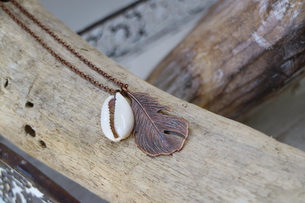 Load image into Gallery viewer, Bohemian copper feather and cowrie shell necklace
