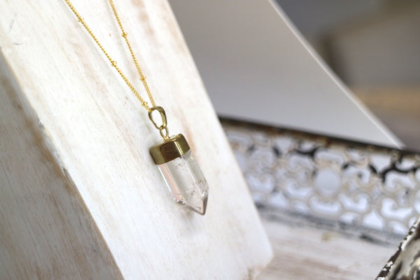 Load image into Gallery viewer, Clear quartz point gold bohemian necklace
