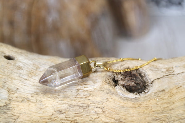 Load image into Gallery viewer, Clear quartz point gold bohemian necklace
