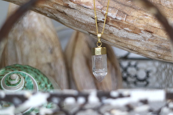 Load image into Gallery viewer, Clear quartz point gold bohemian necklace

