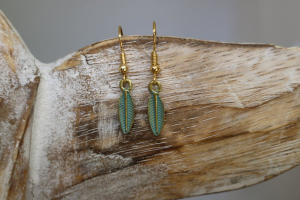 Load image into Gallery viewer, Green patina and gold bohemian leaf earrings
