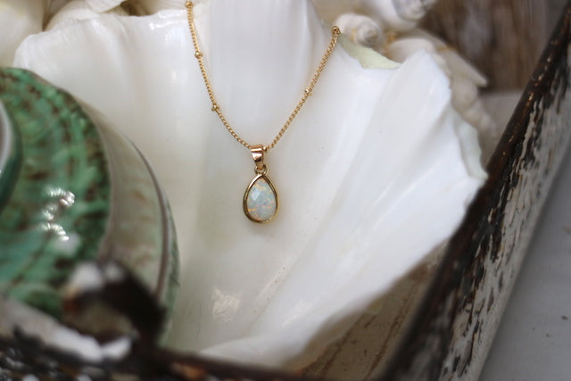 White opal teardrop gold necklace