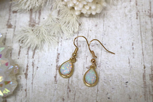 White opal teardrop gold earrings