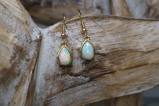 White opal teardrop gold earrings