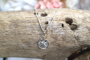 Silver sand dollar shell necklace