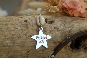Silver cowrie shell and mermaid soul starfish pendant necklace