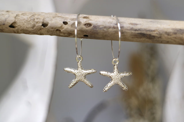 Silver starfish hoop earrings