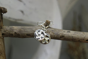 Silver starfish coin earrings