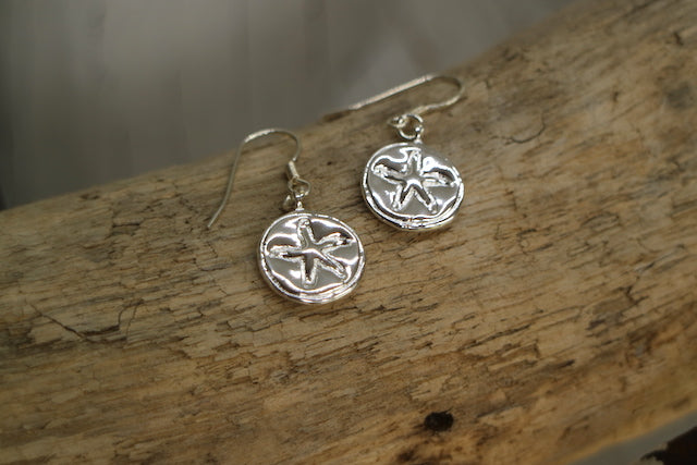 Silver starfish coin earrings