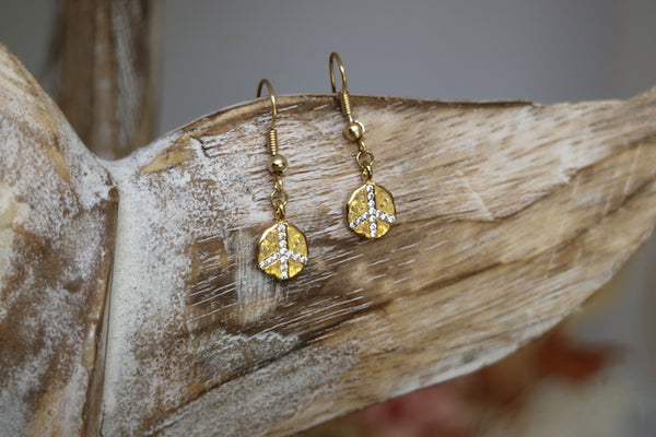 Load image into Gallery viewer, Gold cubic zirconia peace earrings
