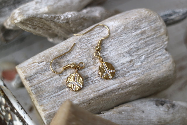 Gold cubic zirconia peace earrings