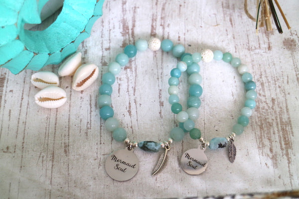 Load image into Gallery viewer, Mother and daugher Amazonite and larimar gemstone bead bracelet set with silver mermaid soul and feather charms
