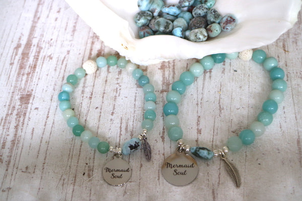 Load image into Gallery viewer, Mother and daugher Amazonite and larimar gemstone bead bracelet set with silver mermaid soul and feather charms
