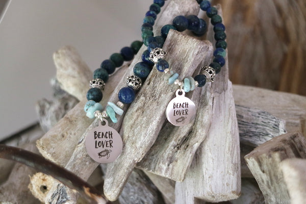 Load image into Gallery viewer, Mother and daughter lapis lazuli and larimar bead bracelet with silver beach charm
