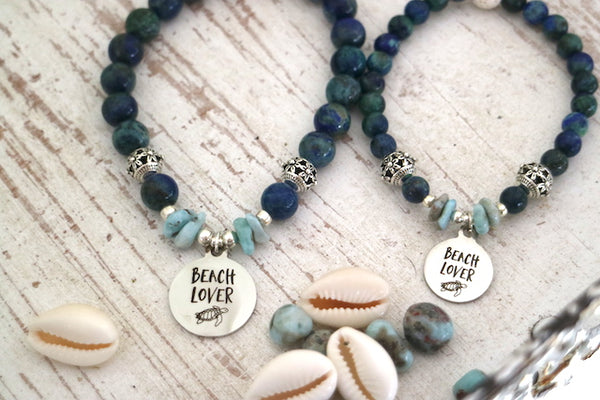 Load image into Gallery viewer, Mother and daughter lapis lazuli and larimar bead bracelet with silver beach charm
