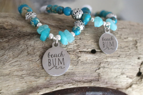 Load image into Gallery viewer, Blue sea jasper and white howlite and amazonite bracelet with silver beach bum charm
