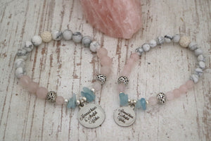 Rose quartz and white howlite and aquamarine bead bracelet with silver charm
