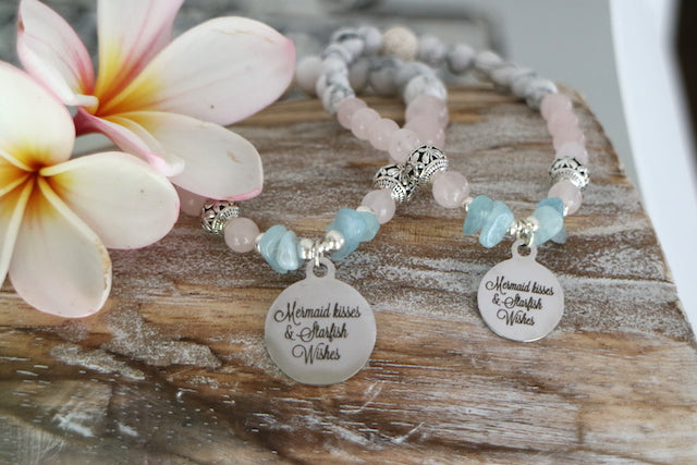 Rose quartz and white howlite and aquamarine bead bracelet with silver charm