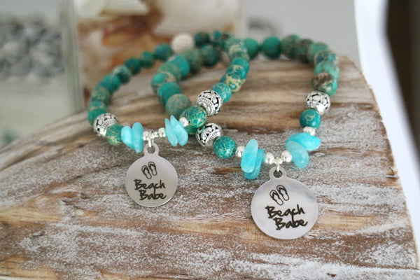 Load image into Gallery viewer, Green Sea Sediment jasper and amazonite bead bracelet with silver beach babe charm
