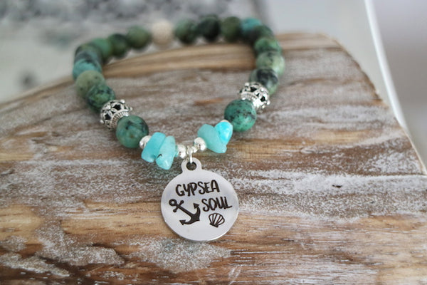 Load image into Gallery viewer, African turquoise and amazonite bead bracelet with silver gypsea soul charm
