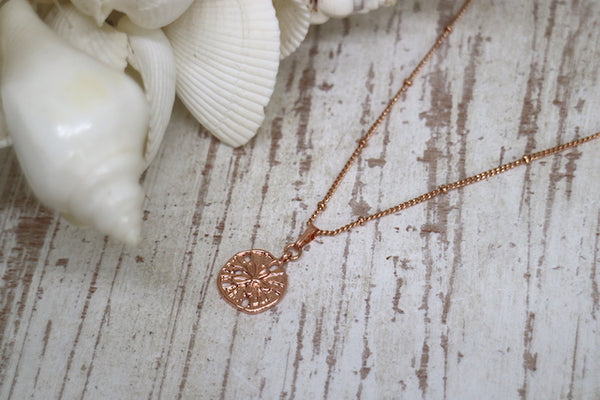 Load image into Gallery viewer, Rose gold sand dollar shell necklace
