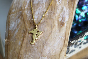 Gold seahorse necklace