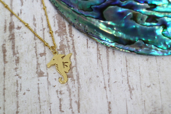 Load image into Gallery viewer, Gold seahorse necklace
