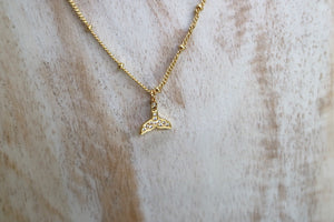 Gold whale tail children's necklace with cubic zirconia