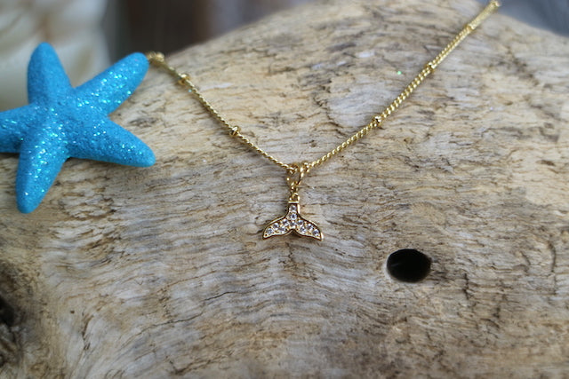 Gold whale tail children's necklace with cubic zirconia